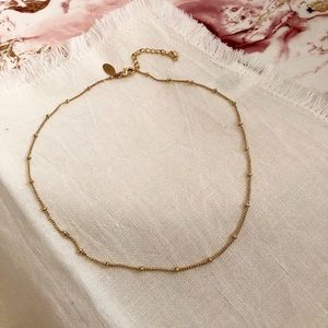 Gold bead chocker